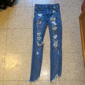AE Next Level High-Waisted Ripped Jegging in Fury size 2